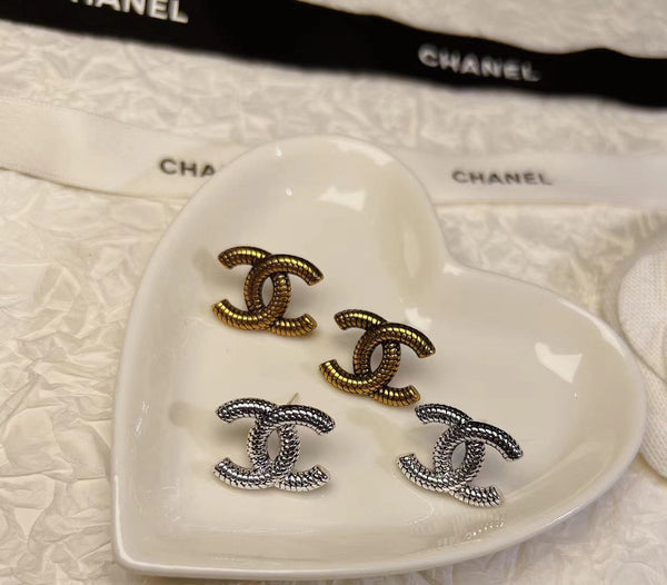 CHANEL CC LOGO EARRING STUDS aged gold twist ES10002