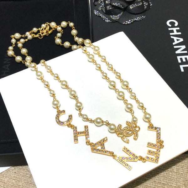 CHANEL LETTERS D LONG PEARL NECKLACE CRYSTAL NL10063