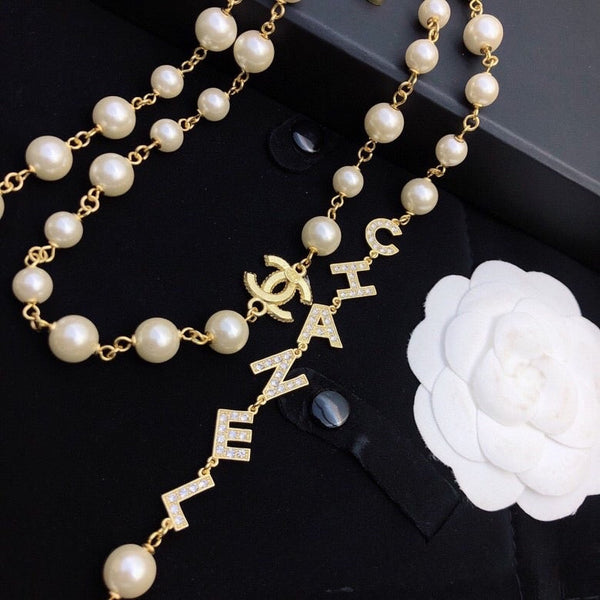 CHANEL LETTERS D LONG PEARL NECKLACE CRYSTAL NL10063