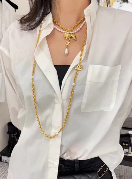 Chanel CC Belt or long pearl lion necklace in gold tone NL10073
