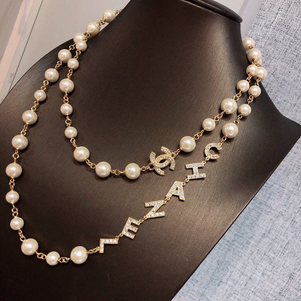 CHANEL LETTERS D LONG PEARL NECKLACE CRYSTAL NL10063