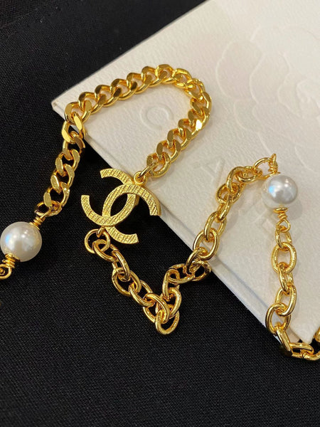 Chanel CC Belt or long pearl lion necklace in gold tone NL10073